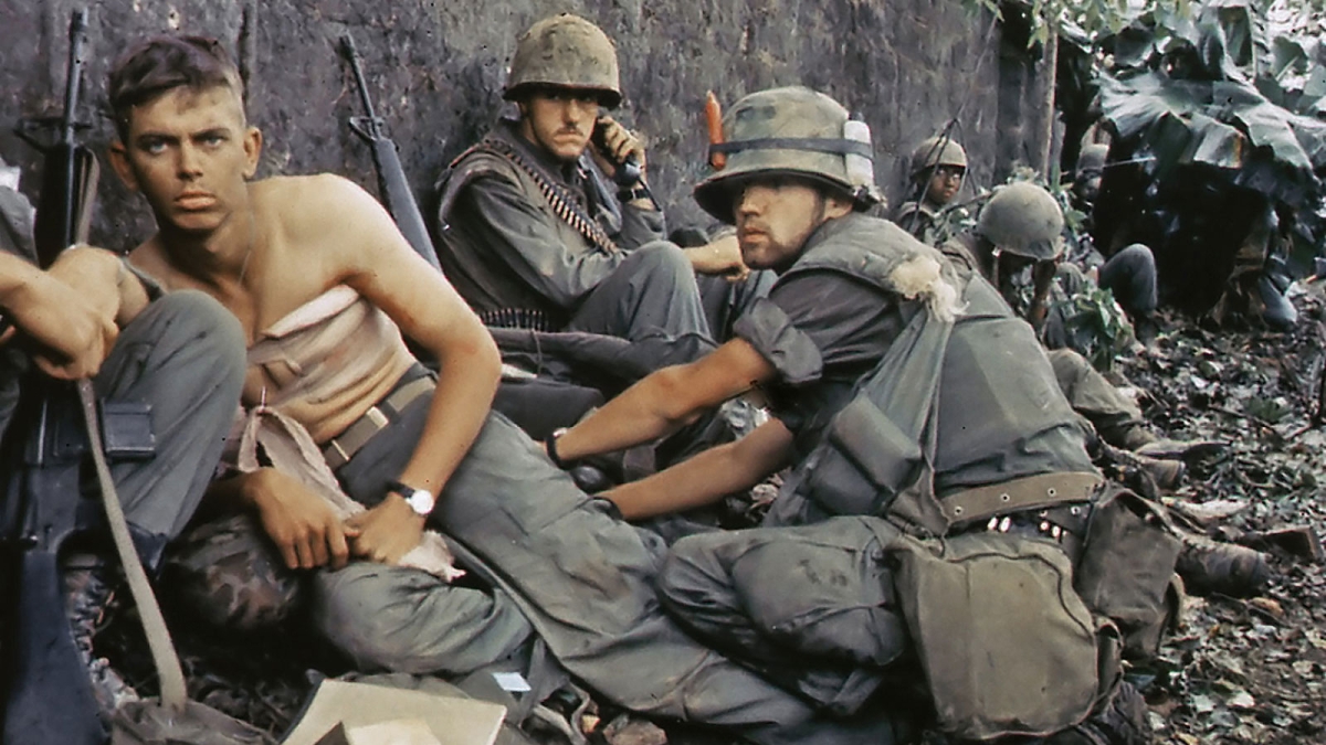 Soldiers tend to the wounded in the Vietnam War