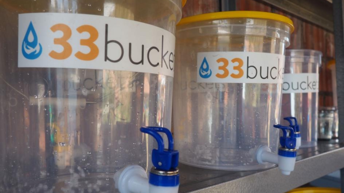 33 Buckets' filtration system uses a system of containers and swappable filters to meet each community's specific water needs.