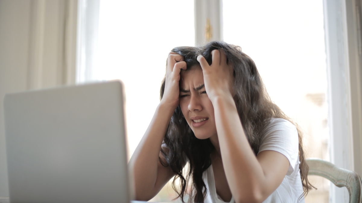 frustrated woman at a computer