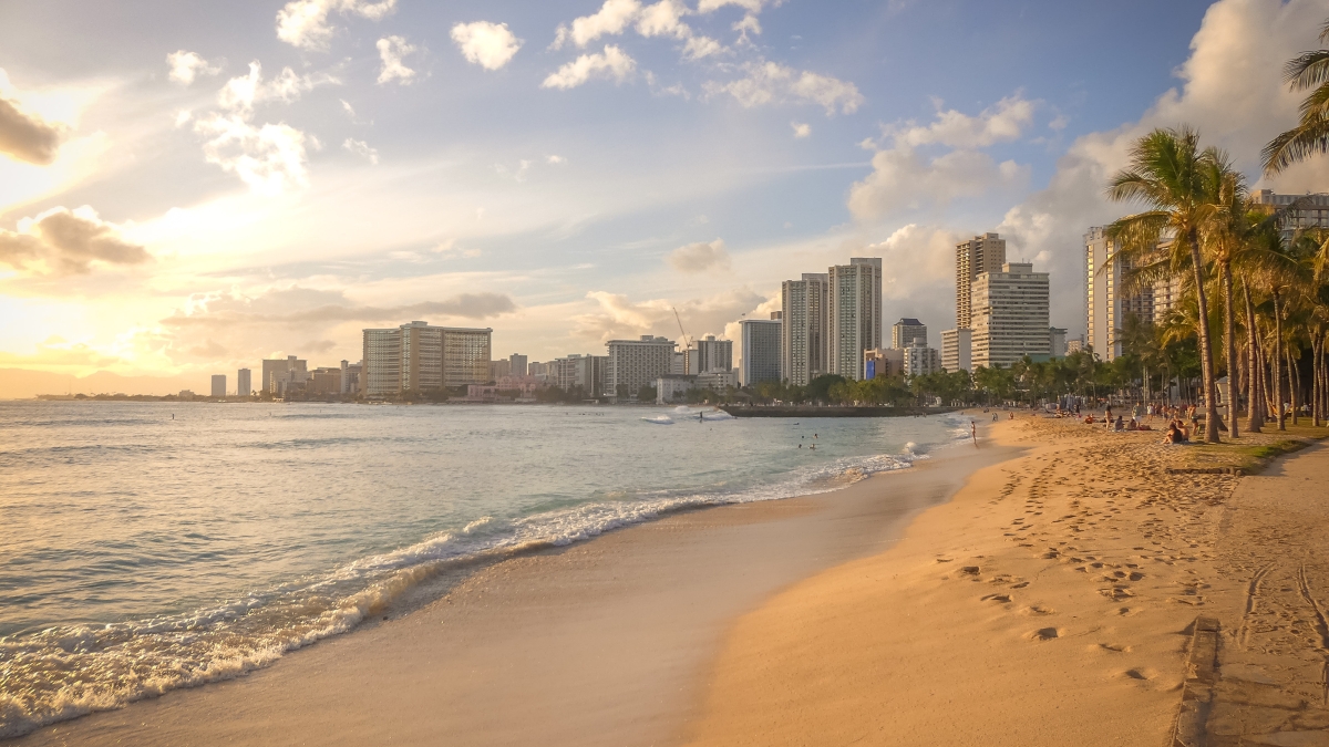 Beach in Honolulu with city line in the background