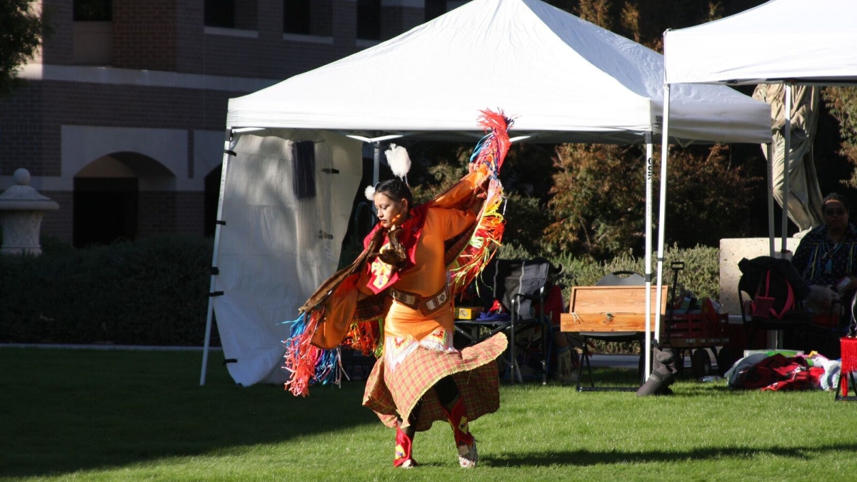 woman dancing at ASU pow-wow