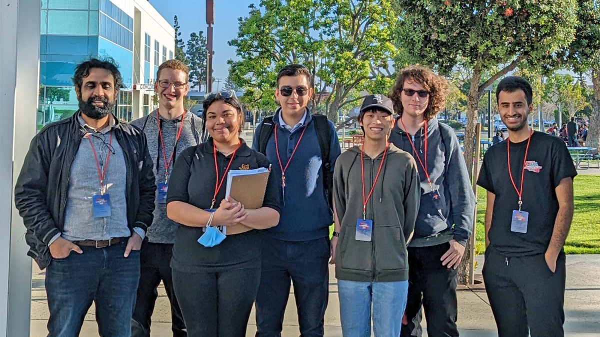 Members of ASU's Collegiate Cyber Defense Competition team pose for a group photo.