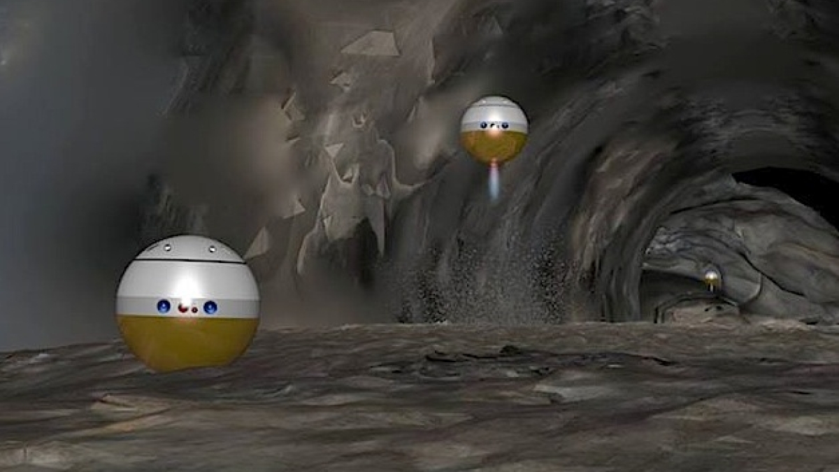 Robots exploring a lunar cave or lava tube