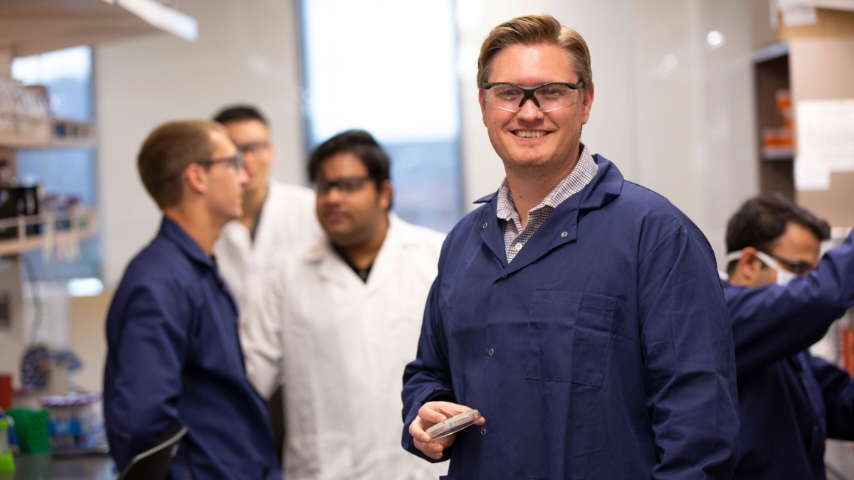 ASU's Brent Nannenga and his research group in their laboratory