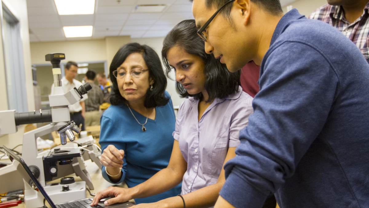 Aerospace engineering doctoral student Nithya Subramanian (center), recently named an Amelia Earhart Fellow by Zonta International, has been studying multifunctional nanocomposites for aerospace applications in ASU Professor Aditi Chattopadhyay’s (left) l