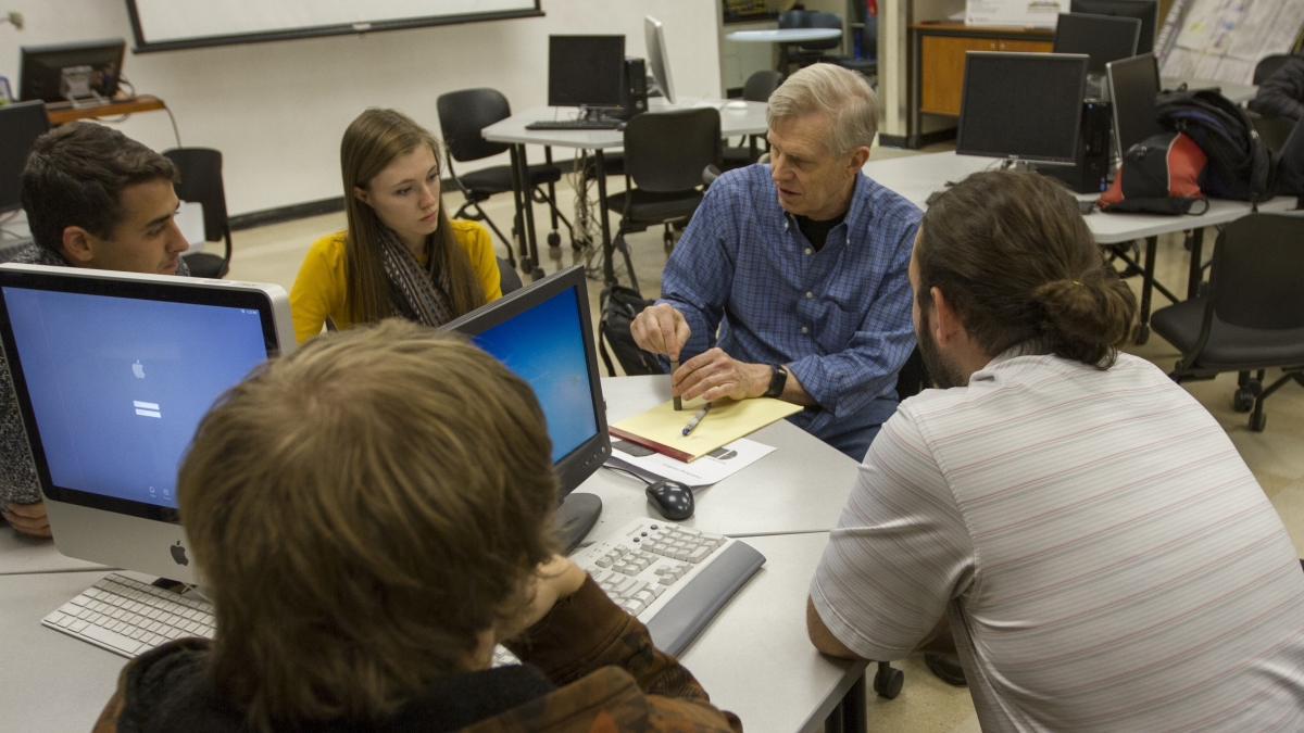 ASU professor interacting with students
