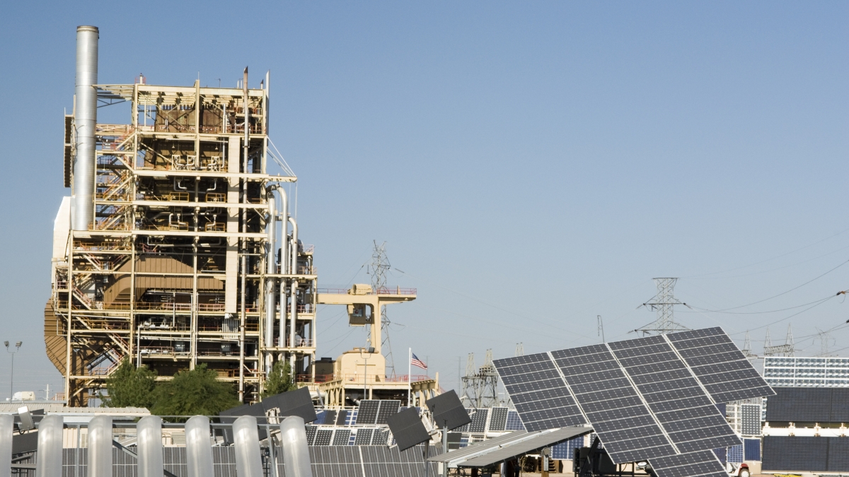 solar panels next to a fossil fuel plant in Arizona