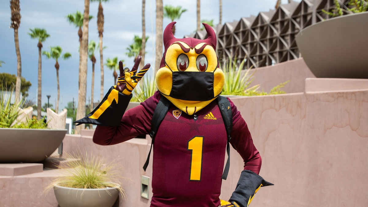 ASU mascot Sparky wearing a mask