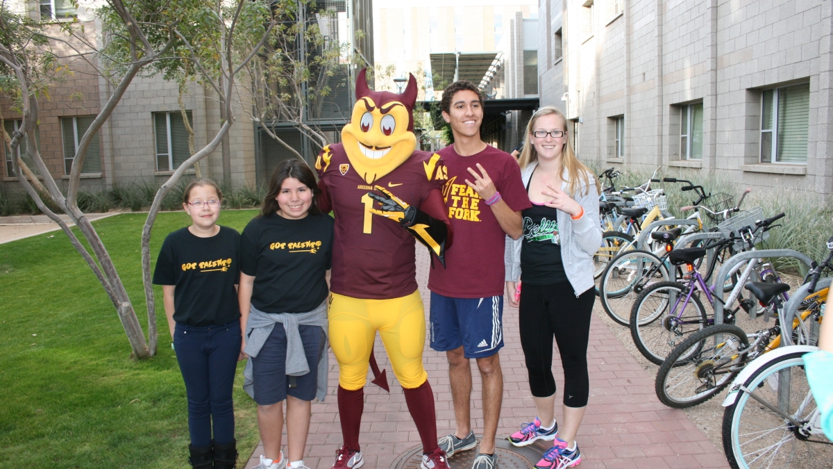 Sparky poses with Talent Match students