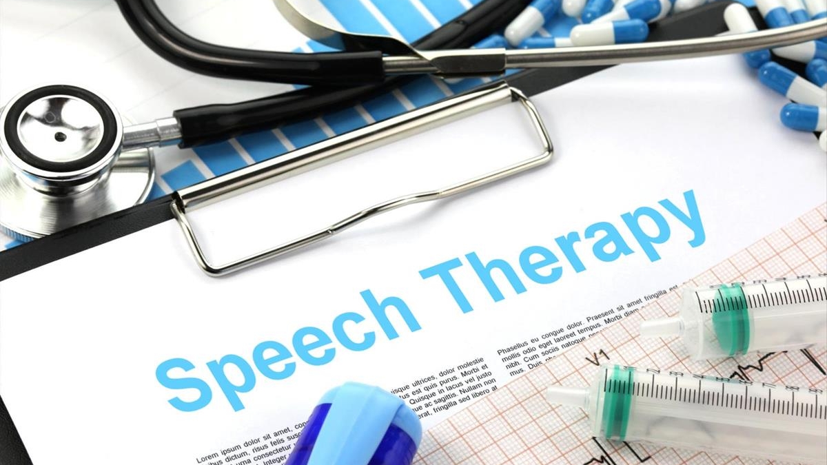 Photo collage of a clipboard, stethescope and medications surrounding the words speech therapy