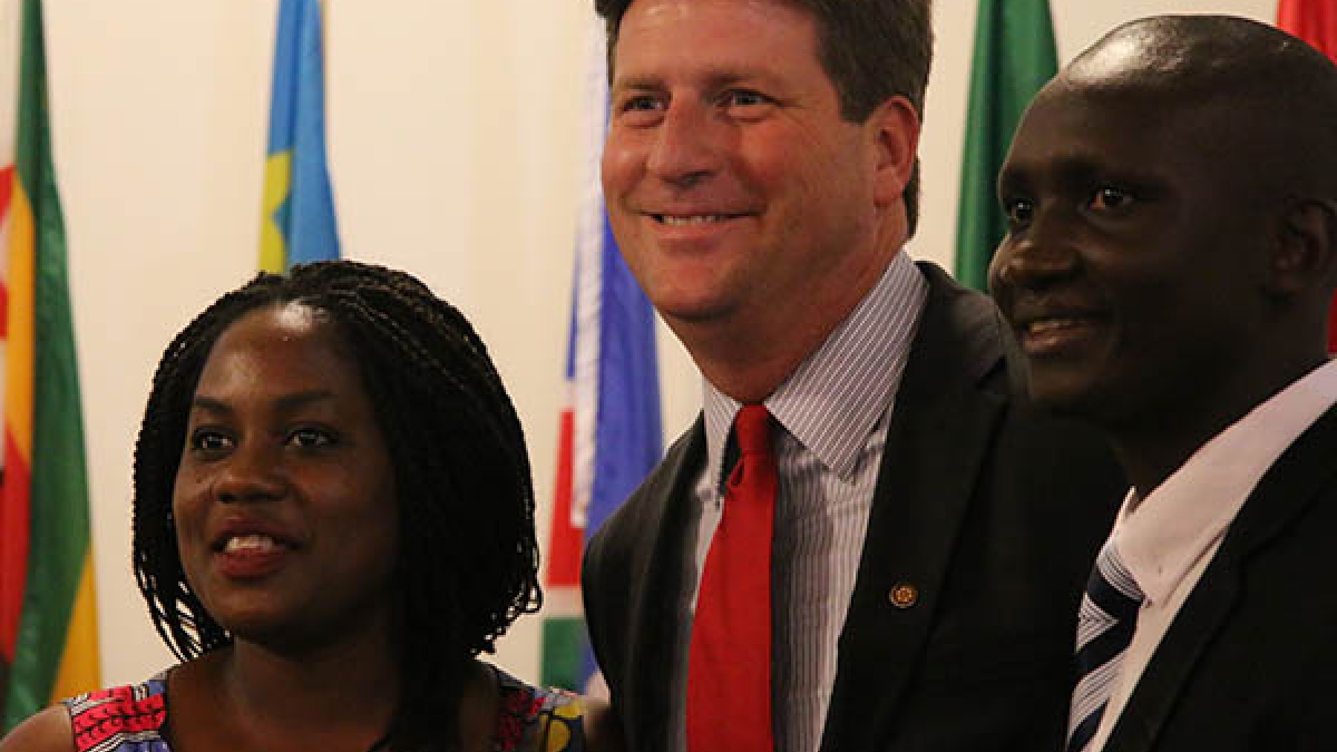 Mayor Greg stanton poses for a photo with fellows Emily Rubooga of Uganda (left)