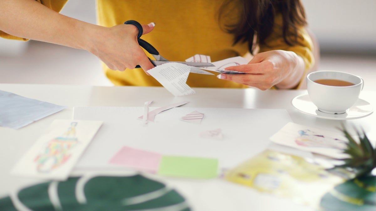 woman cutting paper