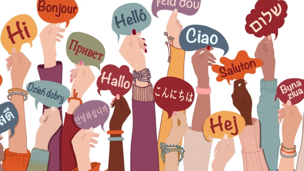 Illustration of hands holding speech balloons that say "hello" in several languages.