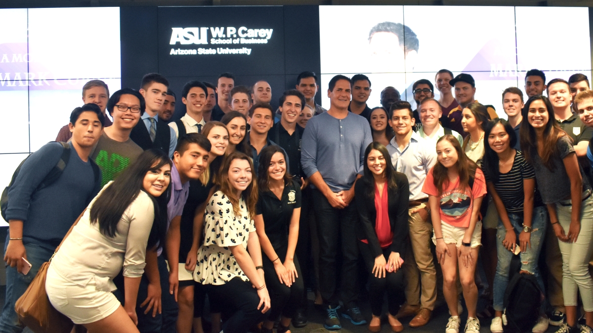 group of students posing with Mark Cuban
