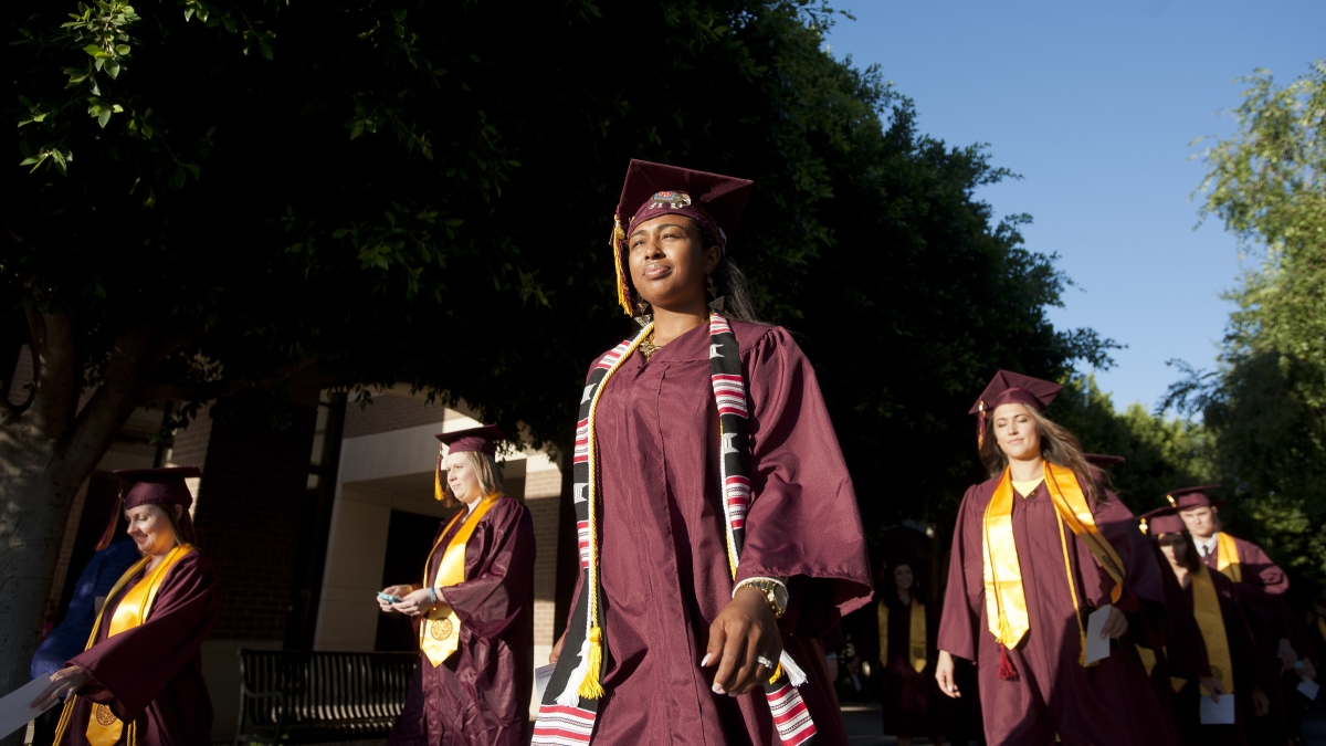 ASU New College graduates walking to commencement
