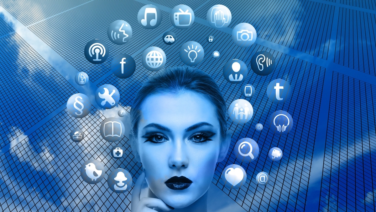 Graphic illustration of a woman's face with various media-realted icons surrounding her.