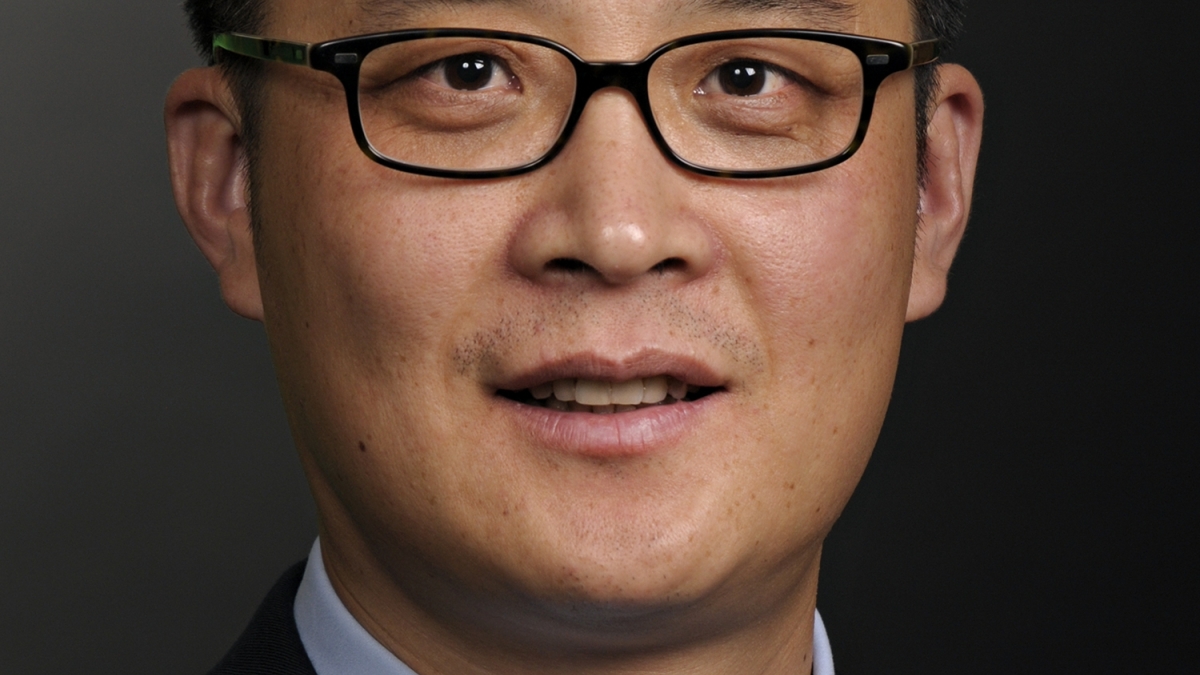 headshot of ASU professor John Zhang
