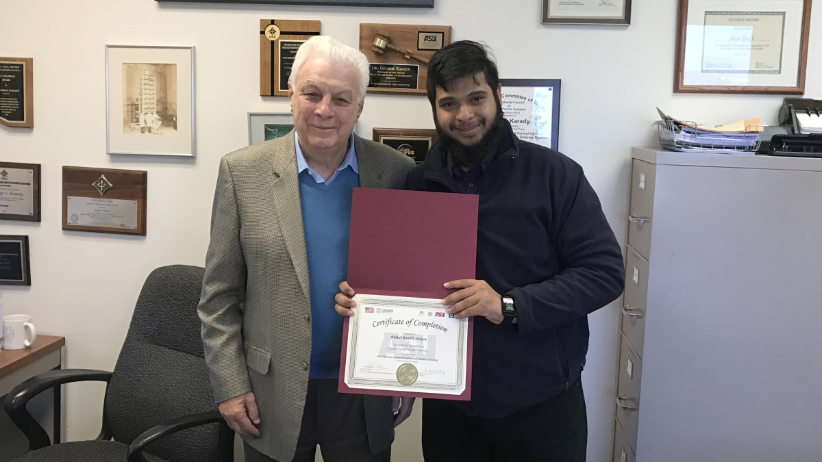 Above: Abdul Kashif Janjua, exchange scholar from the U.S.-Pakistan Centers for Advanced Studies in Energy, known as USPCAS-E, with his certificate of completion from the Power System’s Lab in fall 2016. Photo courtesy of Abdul Kashif Janjua.