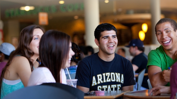 students sitting around table