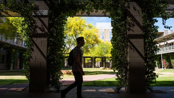 A student walks through the Barrett compound