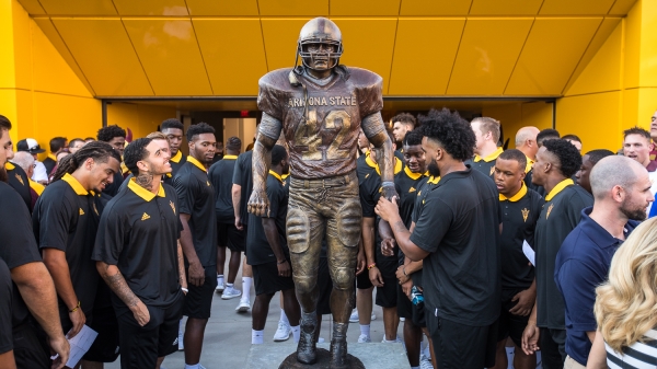 Players view Tillman Statue for first time