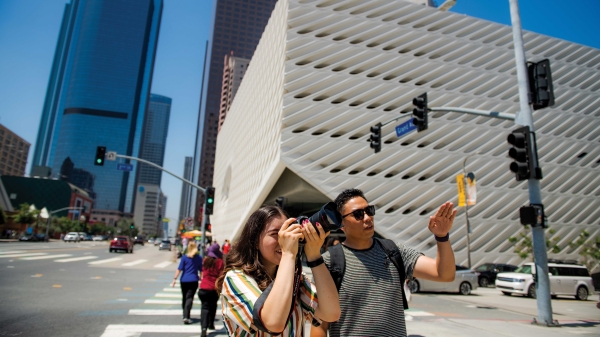 Alisa Murphy take a photo on the streets of Los Angeles