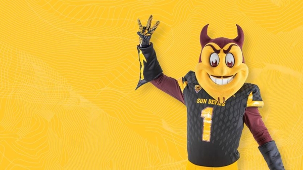 Sparky in a black ASU jersey, holding up a pitchfork