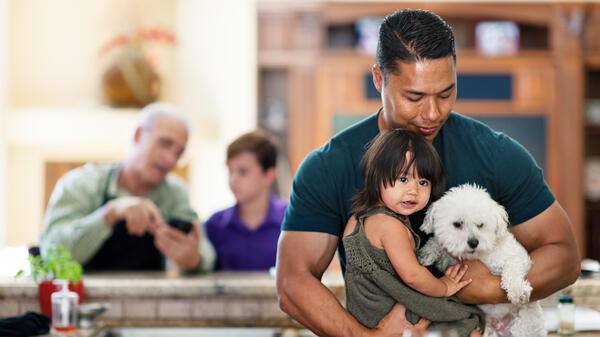 Man holding his daughter