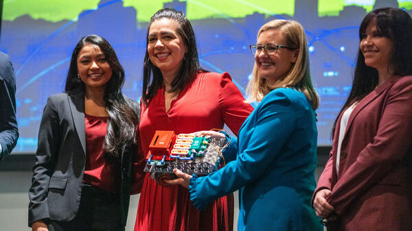 Phoenix Mayor Gallego holds a donated rover kit.