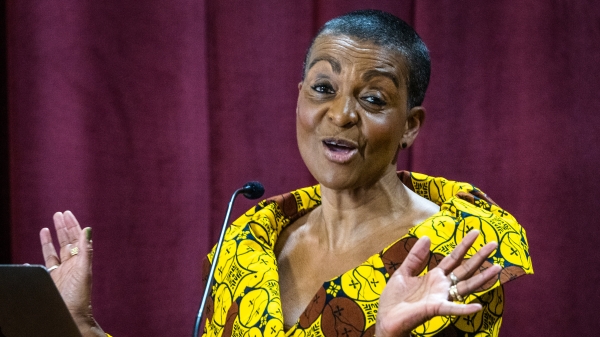 Actor Adjoa Andoh raises her hands as she speaks at ASU