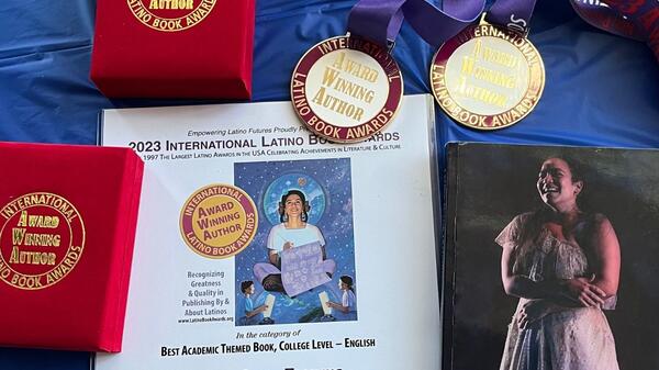 Awards and medals laid out on table