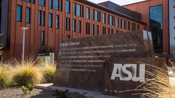 The ASU Charter sign in front of a building