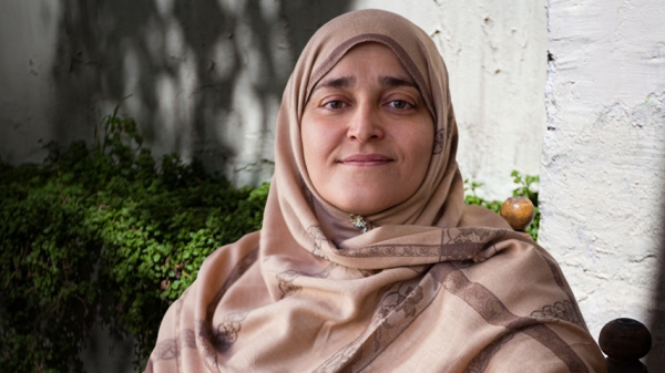 Headshot of Jamila Afghani.