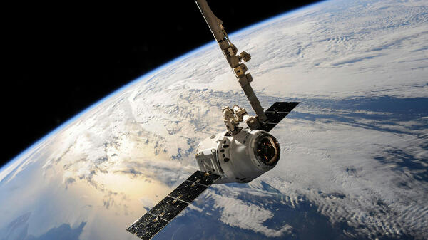 A satellite in space above Earth