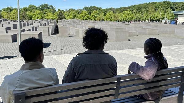 Students looking at the Memorial to the Murdered Jews of Europe