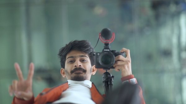 Graduate student Ashish Rajapuram in his element -- camera in hand. 