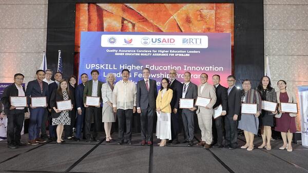 Group of senior academic leaders and higher education officials from across the Philippines pose for a photo.
