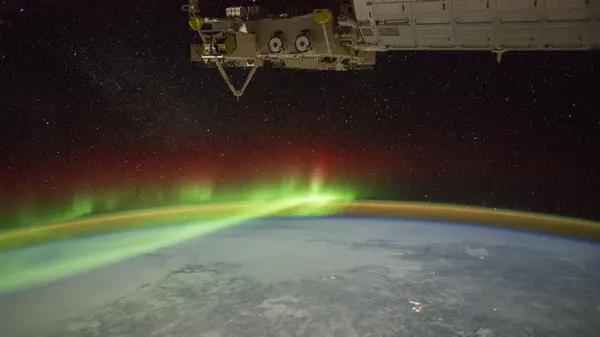An aurora over Earth as seen from space.