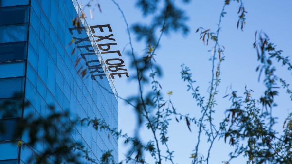 Exterior of Coor Hall showing the word "explore."