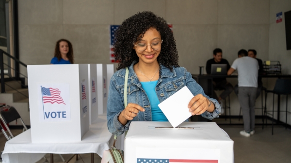 Young person voting.