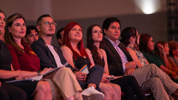 Audience looking up at screen