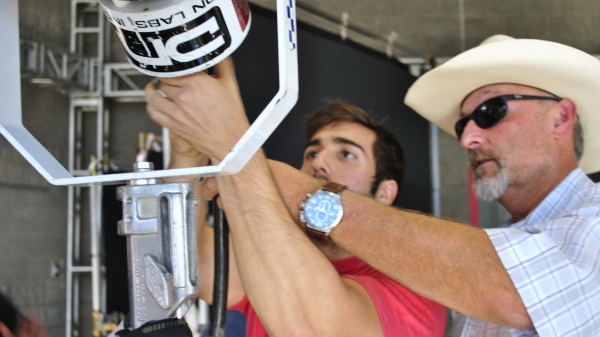 Hollywood film grip Craig “Cowboy” Aines and ASU student on the "Car Dogs" set. 