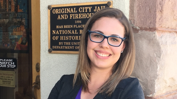 Woman in glasses smiling