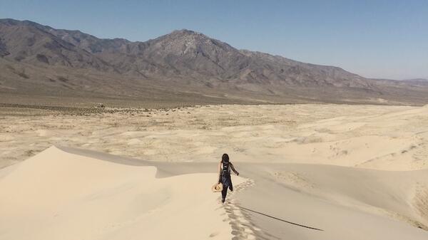Woman walking in the dunes