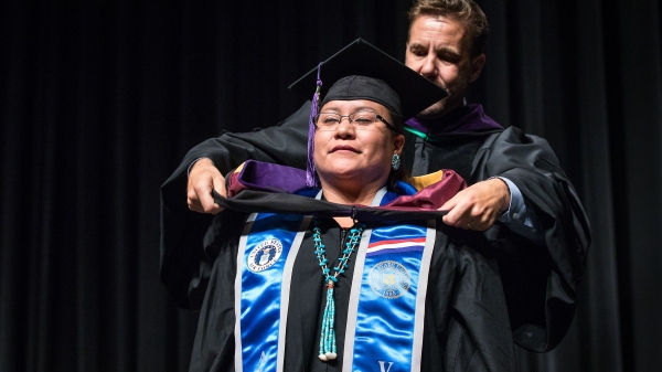 Woman receiving a degree