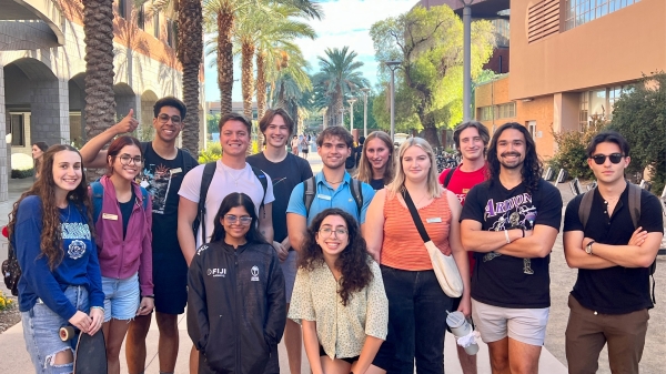 A group of 2023 ASU Space Ambassadors Standing on Palm Walk for a group photo