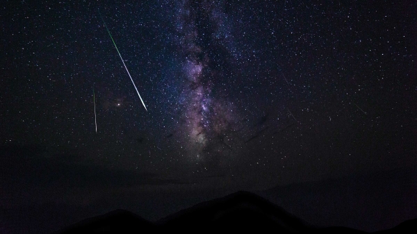 Asteroid streaking across outer space.