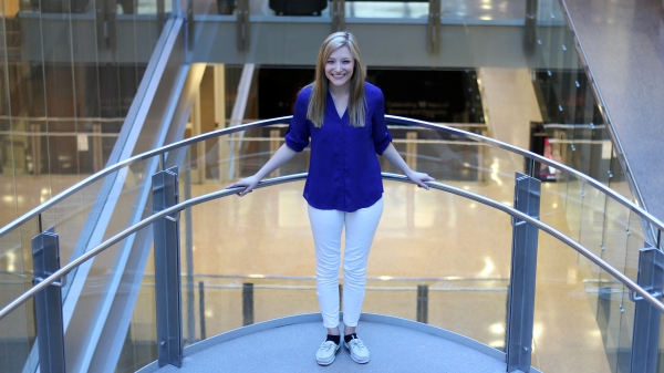 Student Breanne McCarthy portrait on a stairwell Biodesign