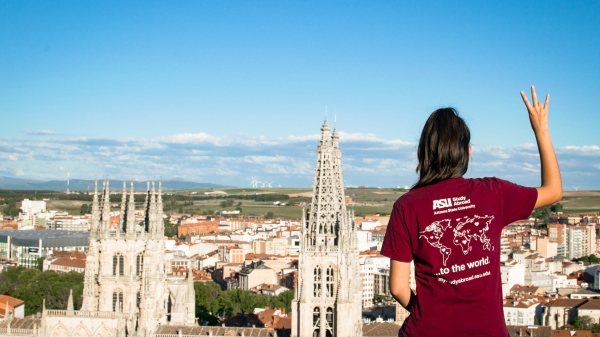ASU student holds up a pitchfork on her study abroad in Spain.