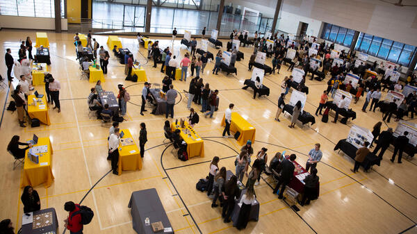 More than 150 teams of students displaying their Capstone Showcase projects at Arizona State University’s Sun Devil Fitness Complex.